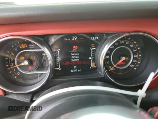 2023 Jeep Wrangler Rubicon with VIN 1C4HJXFG3PW691724, listed as a Copart auction lot 50985745 with 32,377 mi miles and Salvage title. Bid and sale history available at DreamBid. Image 9.