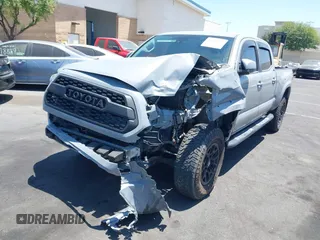 2020 Toyota Tacoma SR5 with VIN 3TMBZ5DN7LM025500, listed as a IAAI auction lot 42651731 with 54,879 mi miles and . Bid and sale history available at DreamBid. Image 6.