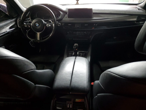 2016 BMW X6 xDrive50i with VIN 5UXKU6C51G0R34443, listed as a Copart auction lot 66511594 with 129,083 mi miles and Salvage Title. Bid and sale history available at carsss.com. Image 8.
