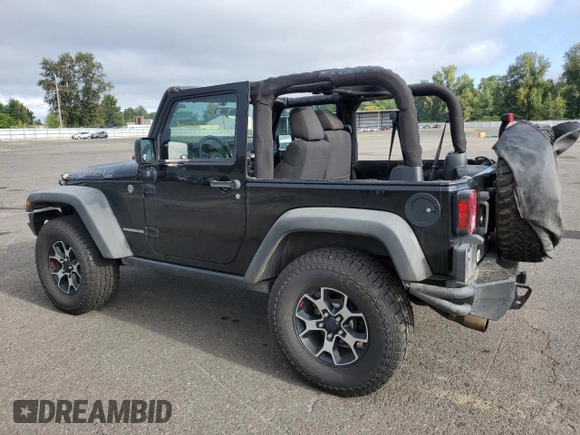 2011 Jeep Wrangler Rubicon with VIN 1J4BA6D12BL507652, listed as a Copart auction lot 69989964 with 127,493 mi miles and Salvage title. Bid and sale history available at DreamBid. Image 2.
