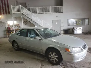 2001 Toyota Camry LE z VIN 4T1BF28K21U963819, wystawiony jako Copart lot #54551465 z przebiegiem 199 472 mil mil oraz Szkoda całkowita • Salvage title. Historia ofert i sprzedaży dostępna na DreamBid. Obrazek 4.