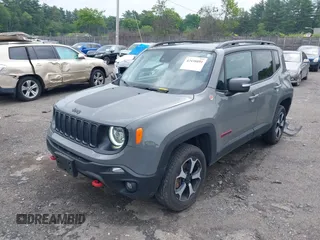 2021 Jeep Renegade Trailhawk with VIN ZACNJDC12MPM56979, listed as a IAAI auction lot 42438891 with 66,926 mi miles and . Bid and sale history available at DreamBid. Image 2.