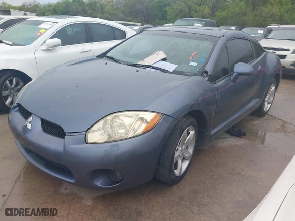 2008 Mitsubishi Eclipse GS with VIN 4A3AK24F78E005409, listed as a IAAI auction lot 41912277 with 143,634 mi miles. Bid and sale history available at carsss.com. Image 2.