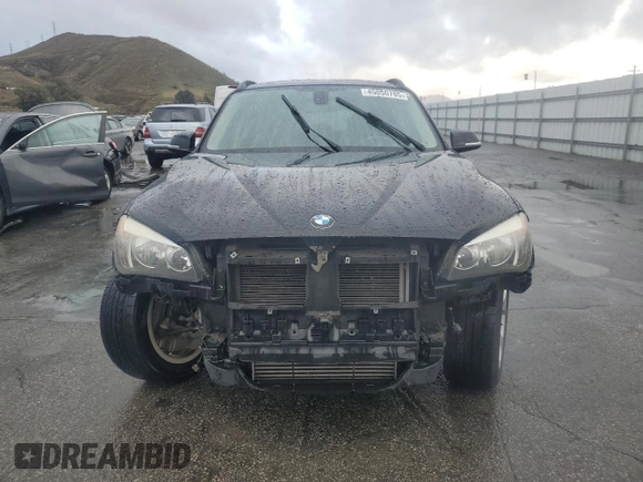 2015 BMW X1 sDrive28i with VIN WBAVM1C55FVW56937, listed as a Copart auction lot 45050785 with 77,736 mi miles and Salvage Title. Bid and sale history available at carsss.com. Image 5.