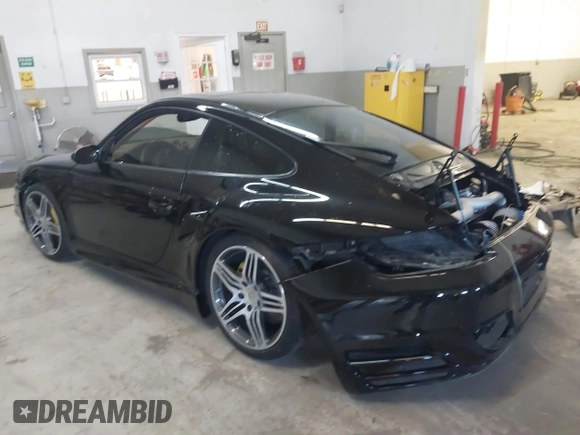 2007 Porsche 911 Turbo with VIN WP0AD29927S784945, listed as a IAAI auction lot 41653014 with 52,319 mi miles. Bid and sale history available at carsss.com. Image 3.