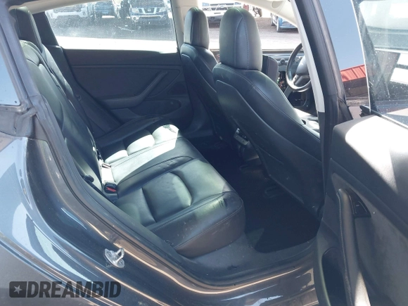 2018 Tesla Model 3 Long Range Battery z VIN 5YJ3E1EB6JF105837, wystawiony jako IAAI lot #41763460 z przebiegiem 100 387 mil mil oraz . Historia ofert i sprzedaży dostępna na DreamBid. Obrazek 8.