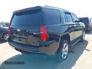 2016 Chevrolet Tahoe LS with VIN 1GNSCAKCXGR482874, listed as a IAAI auction lot 42016639 with 110,744 mi miles and . Bid and sale history available at DreamBid. Image 4.
