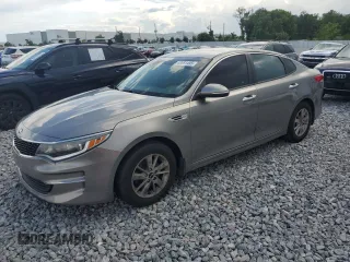 2016 Kia Optima LX z VIN 5XXGT4L33GG114182, wystawiony jako Copart lot #60681495 z przebiegiem 142 157 mil mil oraz Czysty tytuł • Clean title. Historia ofert i sprzedaży dostępna na DreamBid. Obrazek 1.