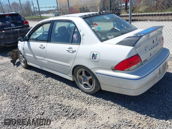 2002 Mitsubishi Lancer OZ-Rally with VIN JA3AJ86E42U039140, listed as a IAAI auction lot 41853888 with 328,181 mi miles and . Bid and sale history available at DreamBid. Image 3.