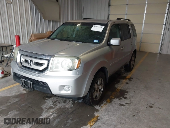 2011 Honda Pilot EX with VIN 5FNYF3H44BB022324, listed as a IAAI auction lot 42199376 with 277,735 mi miles and . Bid and sale history available at carsss.com. Image 2.