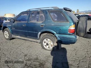 1999 Isuzu Rodeo S with VIN 4S2CK58W1X4349947, listed as a Copart auction lot 84634064 with 135,851 mi miles and Clean Title. Bid and sale history available at DreamBid. Image 2.