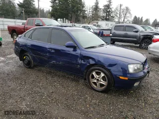 2003 Hyundai Elantra GT with VIN KMHDN55D93U090401, listed as a Copart auction lot 52204635 with 283,464 mi miles and Salvage Title. Bid and sale history available at carsss.com. Image 4.