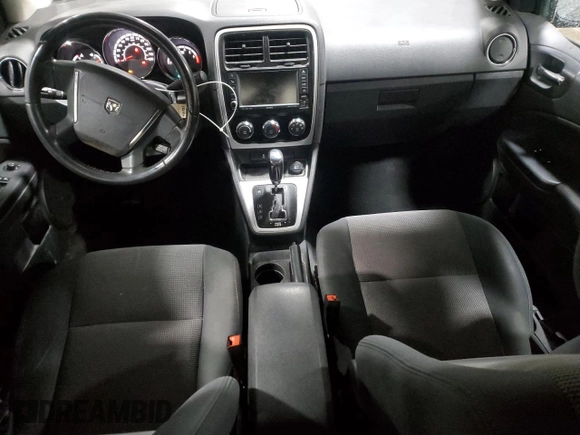 2011 Dodge Caliber Heat with VIN 1B3CB5HA9BD116800, listed as a Copart auction lot 50162915 with 59,629 mi miles and Salvage Title. Bid and sale history available at DreamBid. Image 8.