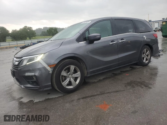 2018 Honda Odyssey EX with VIN 5FNRL6H50JB047999, listed as a Copart auction lot 57819495 with 121,295 mi miles and Salvage title. Bid and sale history available at DreamBid. Image 1.