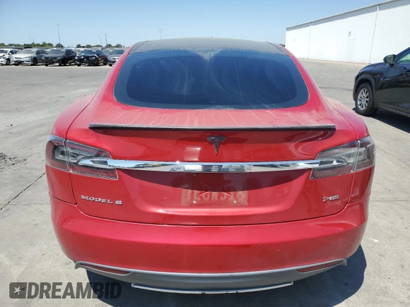 2014 Tesla Model S 60 with VIN 5YJSA1H1XEFP31861, listed as a Copart auction lot 65275815 with Not provided miles and Clean title. Bid and sale history available at DreamBid. Image 6.