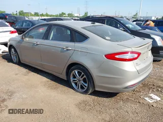2015 Ford Fusion SE Hybrid with VIN 3FA6P0LU7FR243498, listed as a IAAI auction lot 42719986 with 345,098 mi miles and . Bid and sale history available at DreamBid. Image 3.