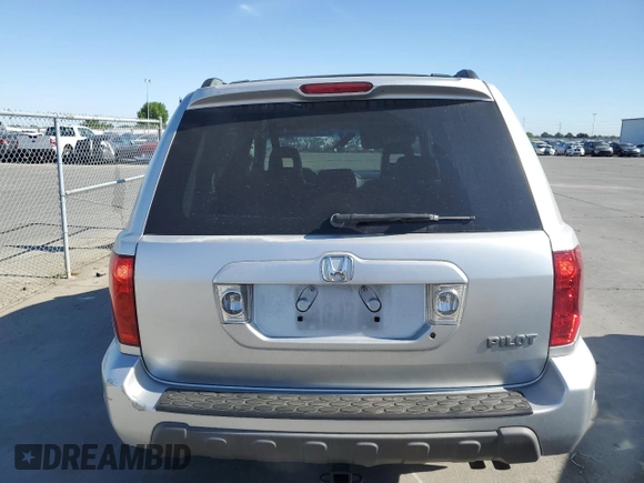 2005 Honda Pilot EX-L z VIN 2HKYF18635H569581, wystawiony jako Copart lot #57295595 z przebiegiem 209 697 mil mil oraz Szkoda całkowita • Salvage title. Historia ofert i sprzedaży dostępna na DreamBid. Obrazek 6.