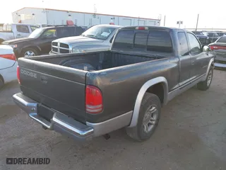 2002 Dodge Dakota SLT with VIN 1B7GL42X42S682184, listed as a IAAI auction lot 41784688 with 168,298 mi miles. Bid and sale history available at carsss.com. Image 4.