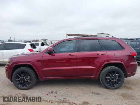 2018 Jeep Grand Cherokee Altitude with VIN 1C4RJEAGXJC281236, listed as a IAAI auction lot 42378899 with 102,276 mi miles and . Bid and sale history available at DreamBid. Image 14.