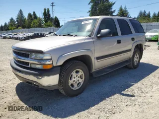 2004 Chevrolet Tahoe LS with VIN 1GNEC13V24J321605, listed as a Copart auction lot 64476065 with 176,551 mi miles and Salvage title. Bid and sale history available at DreamBid. Image 1.