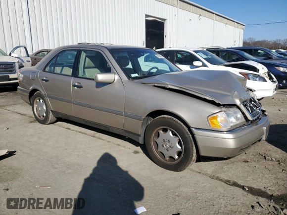 1996 Mercedes-Benz C with VIN WDBHA28E7TF319617, listed as a Copart auction lot 80874744 with 92,068 mi miles and Salvage Title. Bid and sale history available at carsss.com. Image 4.