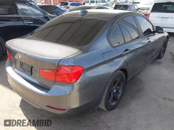 2015 BMW 3 Series 328i with VIN WBA3C1C56FK120073, listed as a IAAI auction lot 42571784 with 162,400 mi miles and . Bid and sale history available at DreamBid. Image 4.