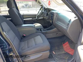 2004 Ford Explorer Sport Trac XLS z VIN 1FMZU67K64UB52672, wystawiony jako IAAI lot #42042467 z przebiegiem 230 135 mil mil oraz . Historia ofert i sprzedaży dostępna na DreamBid. Obrazek 8.