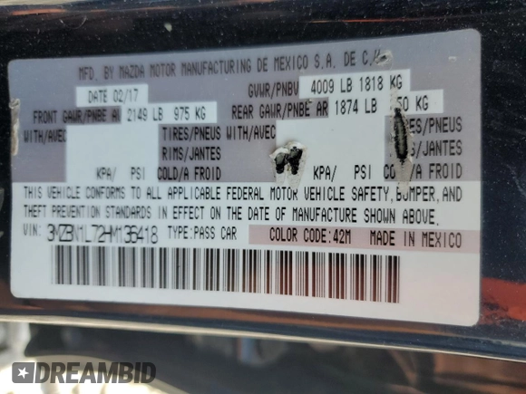 2017 Mazda 3 Touring z VIN 3MZBN1L72HM136418, wystawiony jako Copart lot #59851495 z przebiegiem 161 938 mil mil oraz Czysty tytuł • Clean title. Historia ofert i sprzedaży dostępna na DreamBid. Obrazek 13.