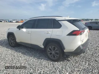 2022 Toyota RAV4 Hybrid XLE Premium with VIN JTMB6RFV4ND535282, listed as a Copart auction lot 61249445 with 82,398 mi miles and Salvage title. Bid and sale history available at DreamBid. Image 2.