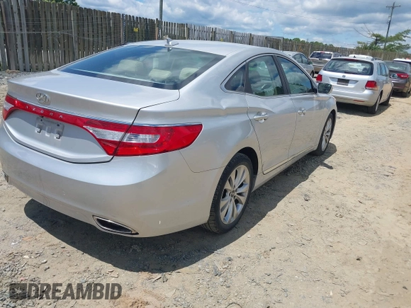 2014 Hyundai Azera Limited z VIN KMHFH4JG9EA397338, wystawiony jako IAAI lot #42352208 z przebiegiem 90 253 mil mil oraz . Historia ofert i sprzedaży dostępna na DreamBid. Obrazek 4.