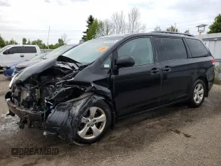 2014 Toyota Sienna LE AAS with VIN 5TDKK3DCXES407711, listed as a Copart auction lot 60225385 with 379,240 mi miles and Salvage title. Bid and sale history available at DreamBid. Image 1.