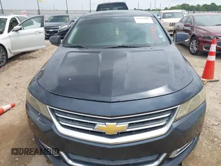 2014 Chevrolet Impala LT with VIN 2G1115SLXE9222573, listed as a IAAI auction lot 42119082 with 147,011 mi miles and . Bid and sale history available at DreamBid. Image 12.
