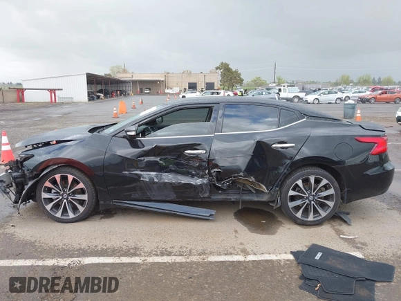 2016 Nissan Maxima SV z VIN 1N4AA6AP8GC408857, wystawiony jako IAAI lot #41892425 z przebiegiem 185 487 mil mil oraz . Historia ofert i sprzedaży dostępna na DreamBid. Obrazek 15.