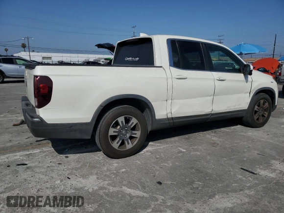 2017 Honda Ridgeline RTL-T with VIN 5FPYK2F65HB011097, listed as a Copart auction lot 63687965 with 186,157 mi miles and Salvage title. Bid and sale history available at DreamBid. Image 3.