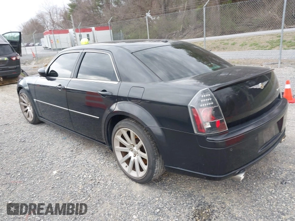 2006 Chrysler 300 C SRT8 with VIN 2C3KA73W06H239927, listed as a IAAI auction lot 41837066 with 169,260 mi miles. Bid and sale history available at carsss.com. Image 3.