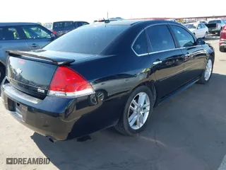 2013 Chevrolet Impala LTZ with VIN 2G1WC5E3XD1208357, listed as a IAAI auction lot 42053811 with 376,518 mi miles. Bid and sale history available at carsss.com. Image 4.