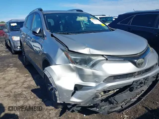 2018 Toyota RAV4 XLE with VIN 2T3WFREV6JW442859, listed as a IAAI auction lot 42252071 with 67,749 mi miles and . Bid and sale history available at DreamBid. Image 6.