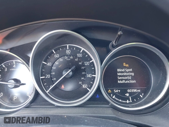 2019 Mazda CX-5 Sport with VIN JM3KFBBM6K1596402, listed as a IAAI auction lot 41971766 with 60,396 mi miles and . Bid and sale history available at DreamBid. Image 7.