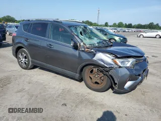 2017 Toyota RAV4 LE with VIN JTMBFREV2HD204349, listed as a Copart auction lot 63006825 with 141,795 mi miles and Salvage title. Bid and sale history available at DreamBid. Image 4.