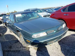 1997 Oldsmobile 88 LS z VIN 1G3HN52K8V4868957, wystawiony jako IAAI lot #40810129 z przebiegiem 117 490 mil mil oraz . Historia ofert i sprzedaży dostępna na DreamBid. Obrazek 1.