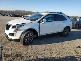 2023 Cadillac XT5 AWD Sport with VIN 1GYKNGRS1PZ137696, listed as a Copart auction lot 89292815 with 23,594 mi miles and Salvage title. Bid and sale history available at DreamBid. Image 1.
