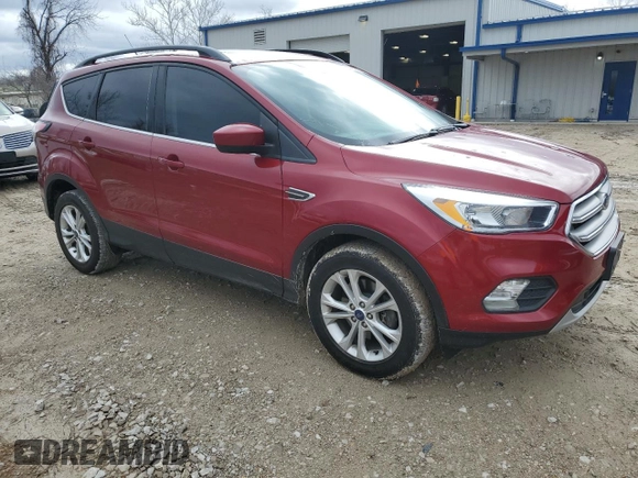 2018 Ford Escape SE z VIN 1FMCU9GD1JUC72707, wystawiony jako Copart lot #47829264 z przebiegiem 96 341 mil mil oraz Szkoda całkowita • Salvage title. Historia ofert i sprzedaży dostępna na DreamBid. Obrazek 4.