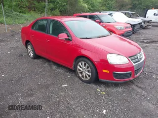 2010 Volkswagen Jetta Sedan Limited with VIN 3VWAX7AJ5AM145529, listed as a IAAI auction lot 42111201 with 156,307 mi miles. Bid and sale history available at carsss.com. Image 1.