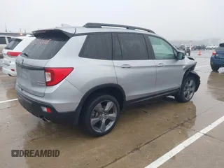 2021 Honda Passport Touring z VIN 5FNYF8H9XMB019732, wystawiony jako IAAI lot #41459208 z przebiegiem 41 745 mil mil oraz . Historia ofert i sprzedaży dostępna na DreamBid. Obrazek 4.