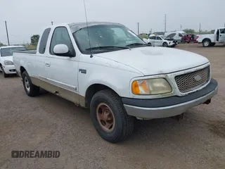 2000 Ford F-150 XL with VIN 1FTZX1720YNA34258, listed as a IAAI auction lot 42300166 with Not provided miles and . Bid and sale history available at DreamBid. Image 1.