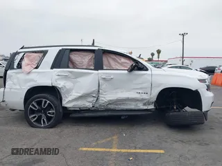 2018 Chevrolet Tahoe Premier z VIN 1GNSKCKJ6JR252253, wystawiony jako IAAI lot #42354486 z przebiegiem Nie podano mil oraz . Historia ofert i sprzedaży dostępna na DreamBid. Obrazek 12.