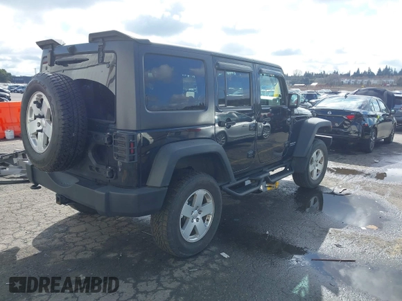 2011 Jeep Wrangler Unlimited Rubicon with VIN 1J4BA6H13BL513311, listed as a IAAI auction lot 41809207 with 124,716 mi miles and . Bid and sale history available at DreamBid. Image 4.