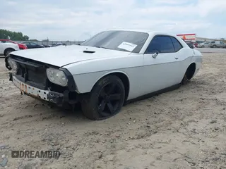2013 Dodge Challenger SXT с VIN 2C3CDYAG0DH607372, выставлен на аукционе IAAI как лот 42819112 с пробегом 223 376 миль миль и . История ставок и продаж доступна на DreamBid. Изображение 6.