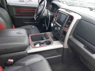 2016 Ram 1500 Rebel z VIN 1C6RR7YT0GS100285, wystawiony jako IAAI lot #42346719 z przebiegiem 103 309 mil mil oraz . Historia ofert i sprzedaży dostępna na DreamBid. Obrazek 5.