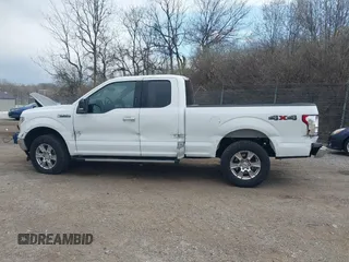 2015 Ford F-150 XLT with VIN 1FTFX1EFXFFC18381, listed as a IAAI auction lot 41886719 with 162,644 mi miles and . Bid and sale history available at DreamBid. Image 15.